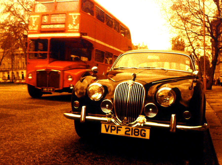 Jaguar and Bus Photograph by David Harding