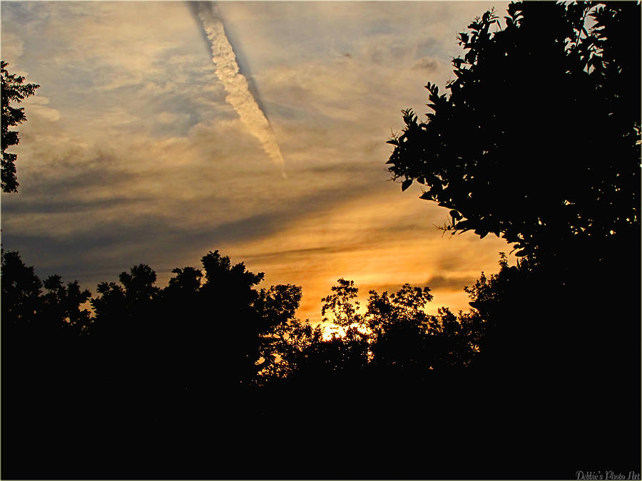 Jet trail sunset Photograph by Debbie Portwood