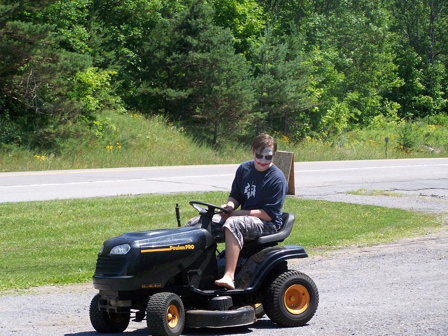 Joker Mowing Photograph by Tanya Stringer - Pixels