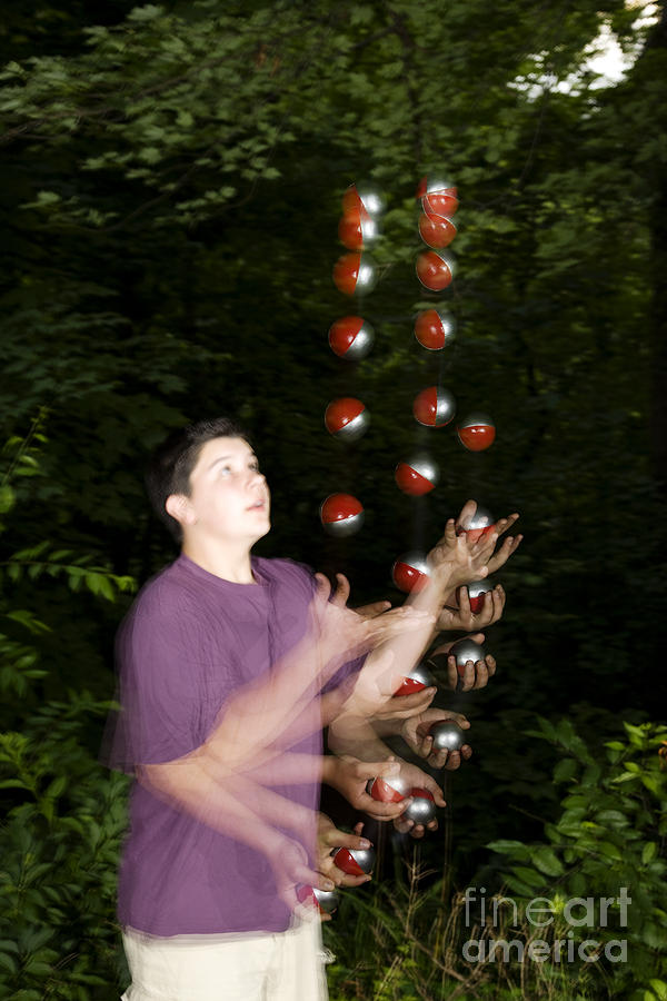 Juggling Balls Photograph by Ted Kinsman