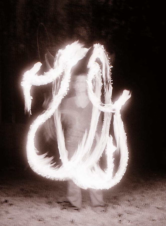 Juggling Fire Photograph by Katherine Huck Fernie Howard