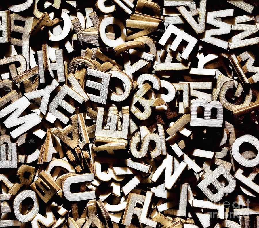 Jumbled letters Photograph by Simon Bratt