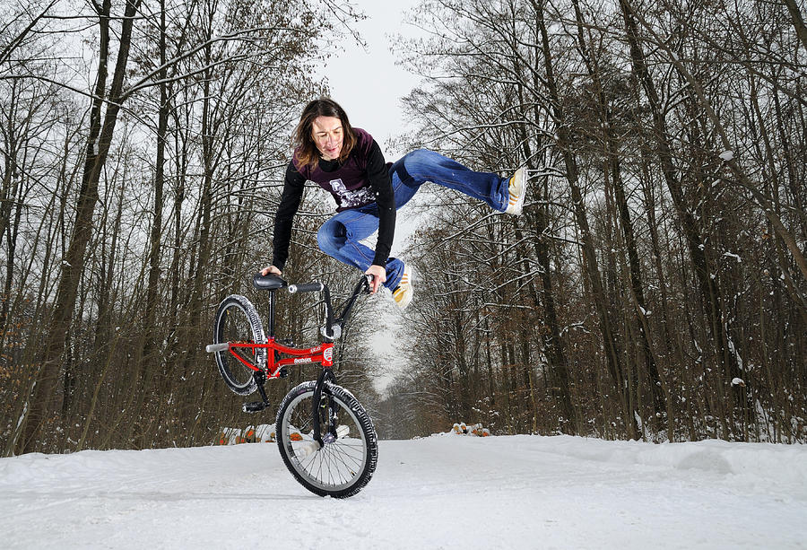 Jumping BMX Flatland girl Photograph by Matthias Hauser