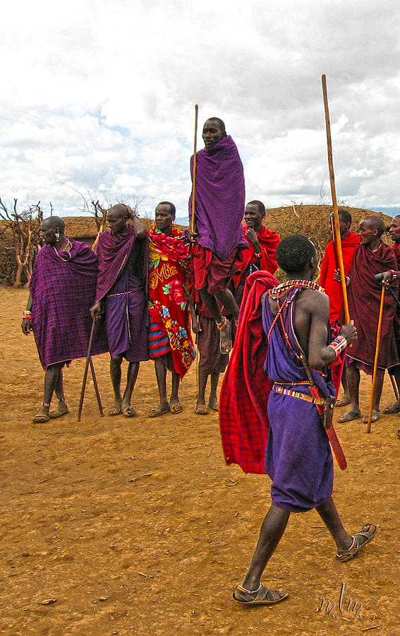Jumping Masai Photograph by Marie Morrisroe