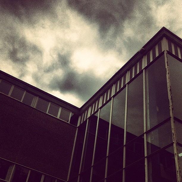 Architecture Photograph - #juxtaposition #clouds #cloudporn by Ben Lowe
