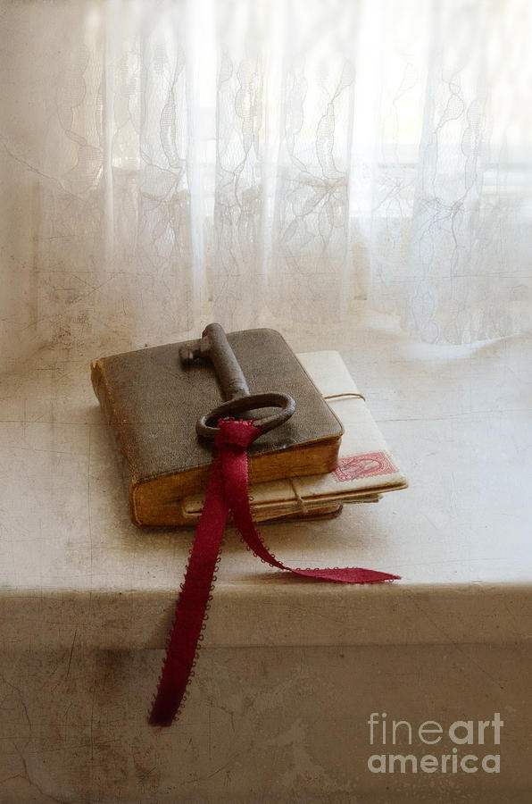Key and Book Resting on Windowsill Photograph by Jill Battaglia