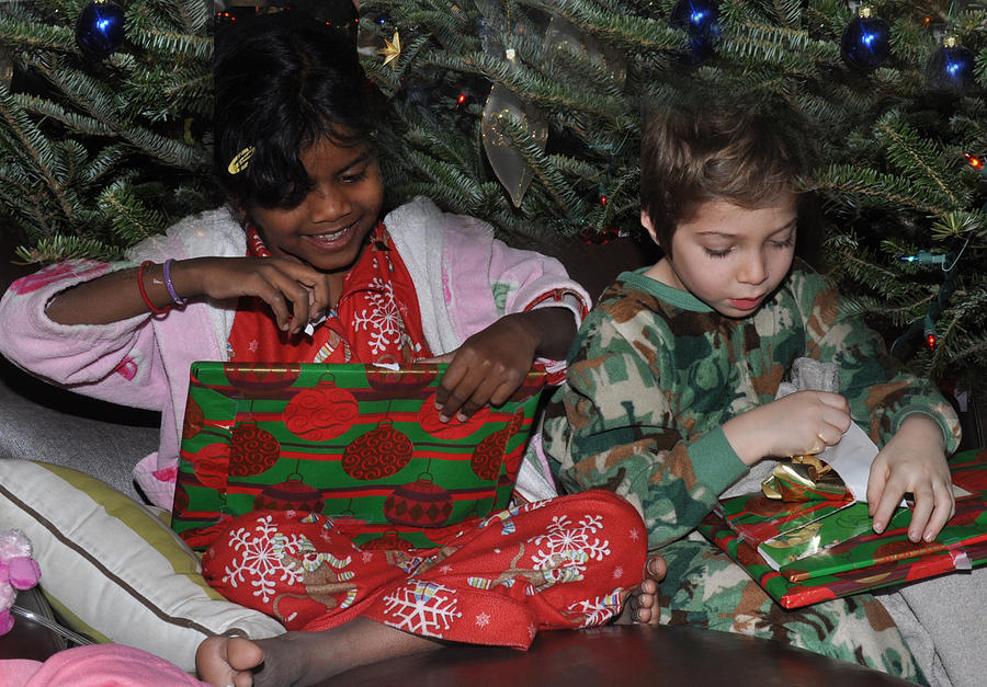 Kids Open Christmas Gifts Photograph by Diane Lent