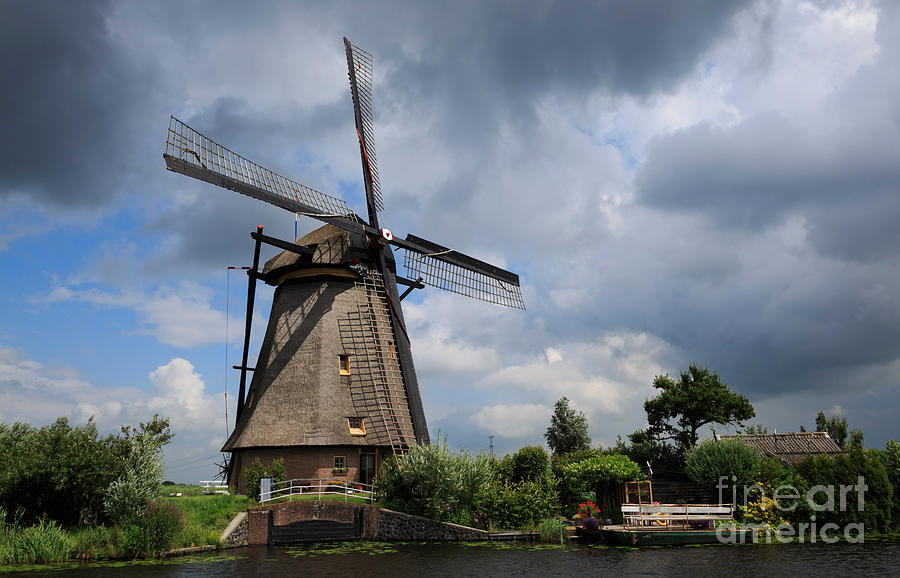 Kinderdijk windmill Photograph by Louise Heusinkveld