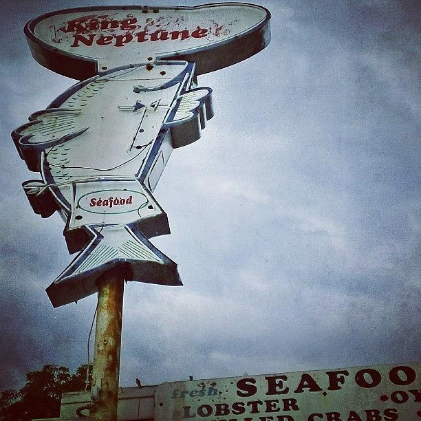 Clouds Photograph - King Neptune Seafood In Dallas by John Robinson