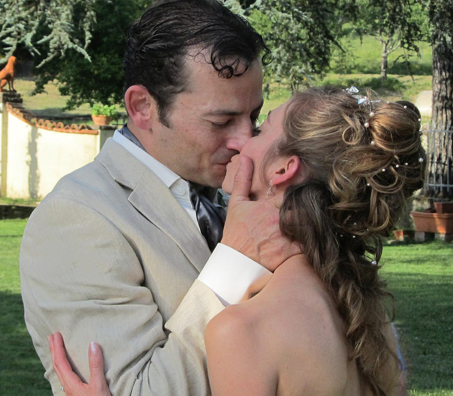 Kiss the bride Photograph by Randy Wehner