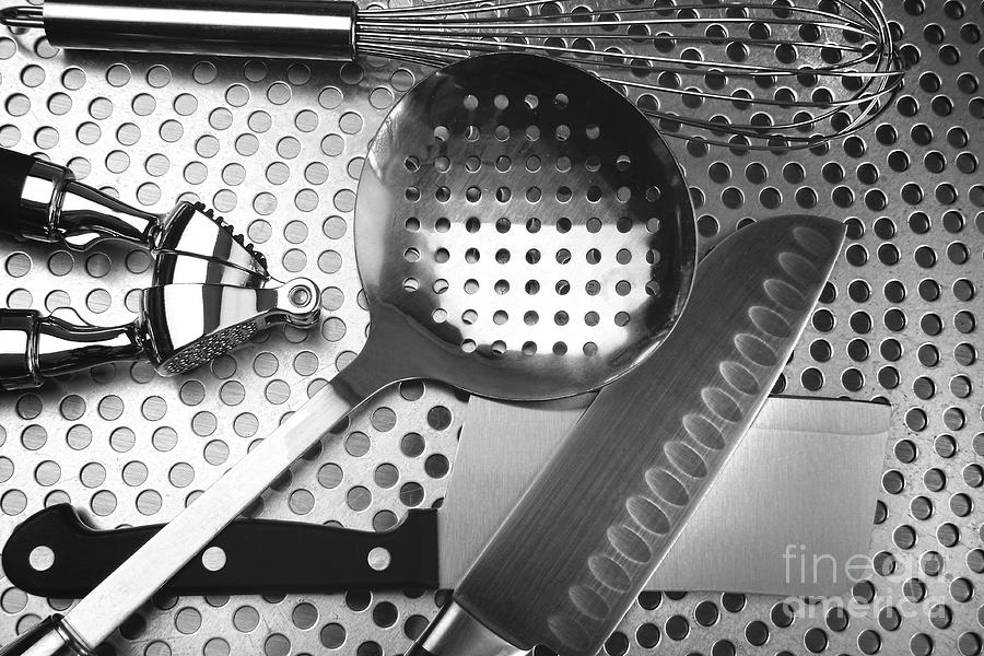 Kitchen utensils on stainless steel Photograph by Sandra Cunningham