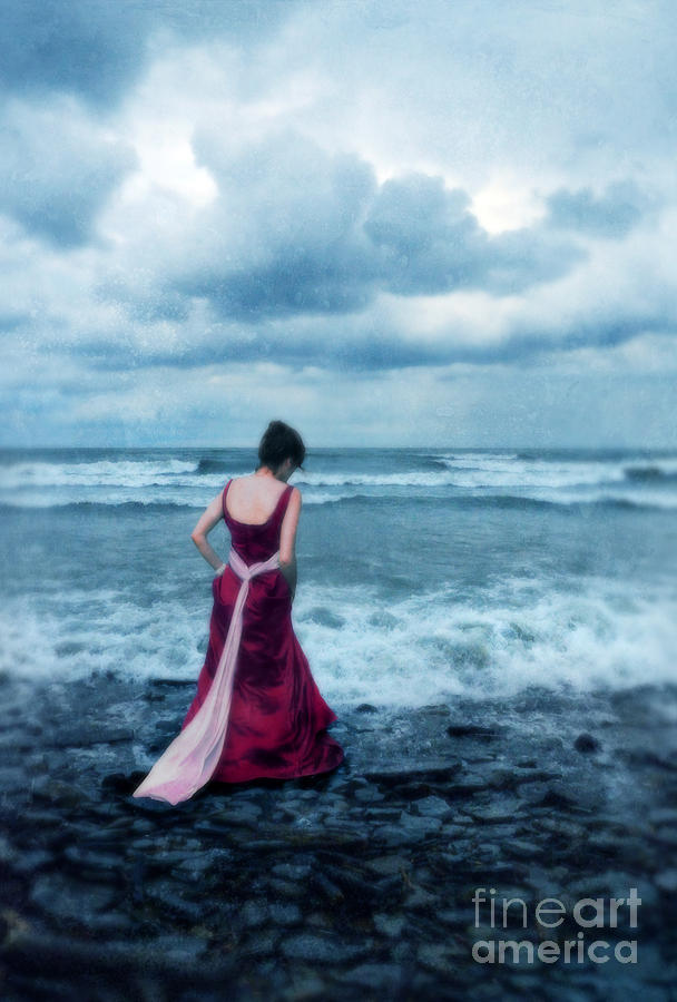 Lady in Red by the Stormy Sea Photograph by Jill Battaglia