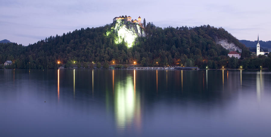 Lake Bled castle at dawn Photograph by Ian Middleton