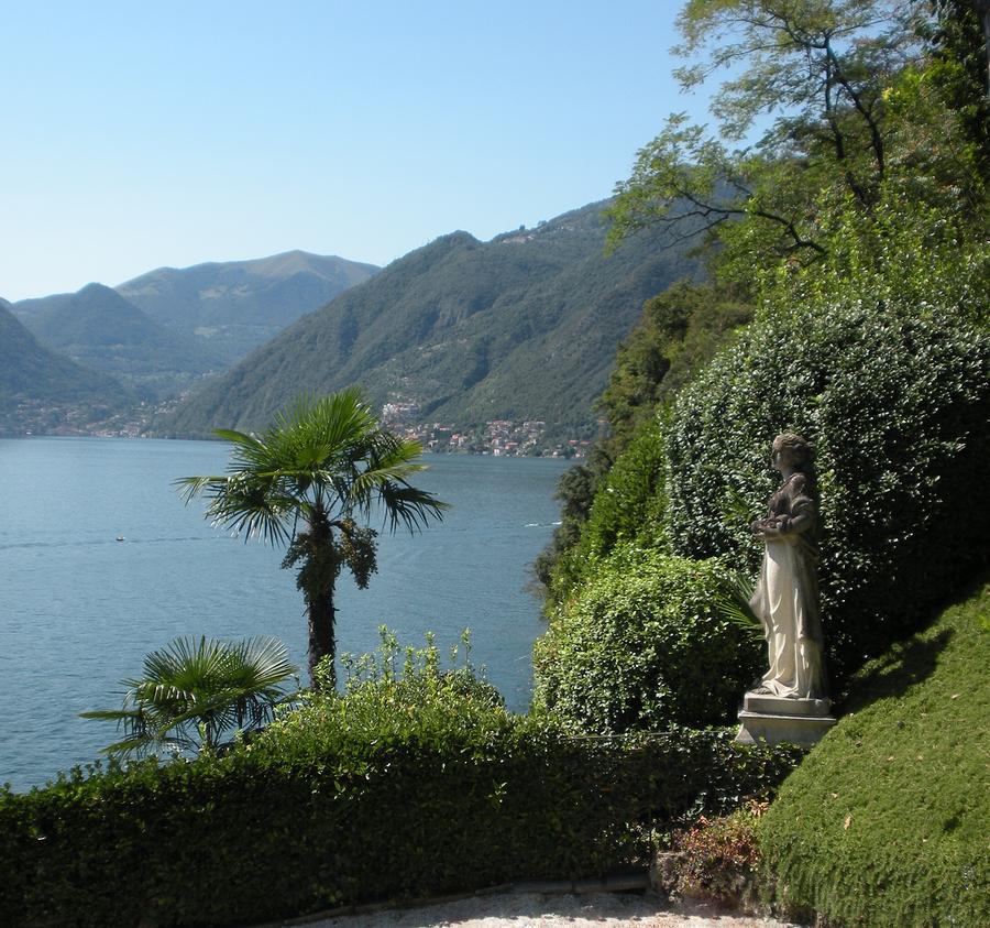 Lake Como And Statue Photograph by Marilyn Dunlap