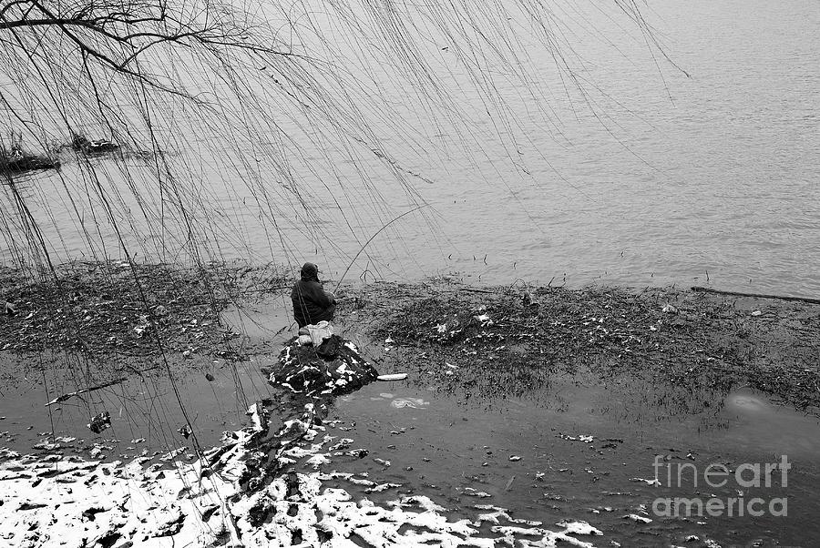 Lake Fisherman in the Snow Photograph by Dean Harte