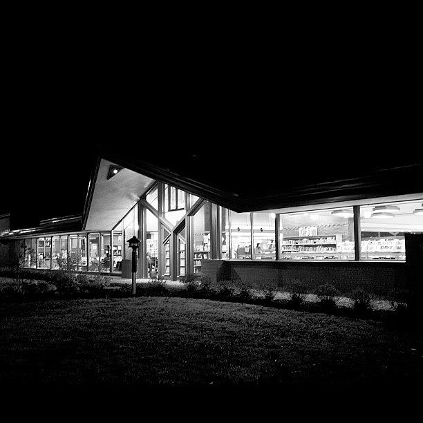 Architecture Photograph - #lake #geneva #library At #night by Aran Ackley