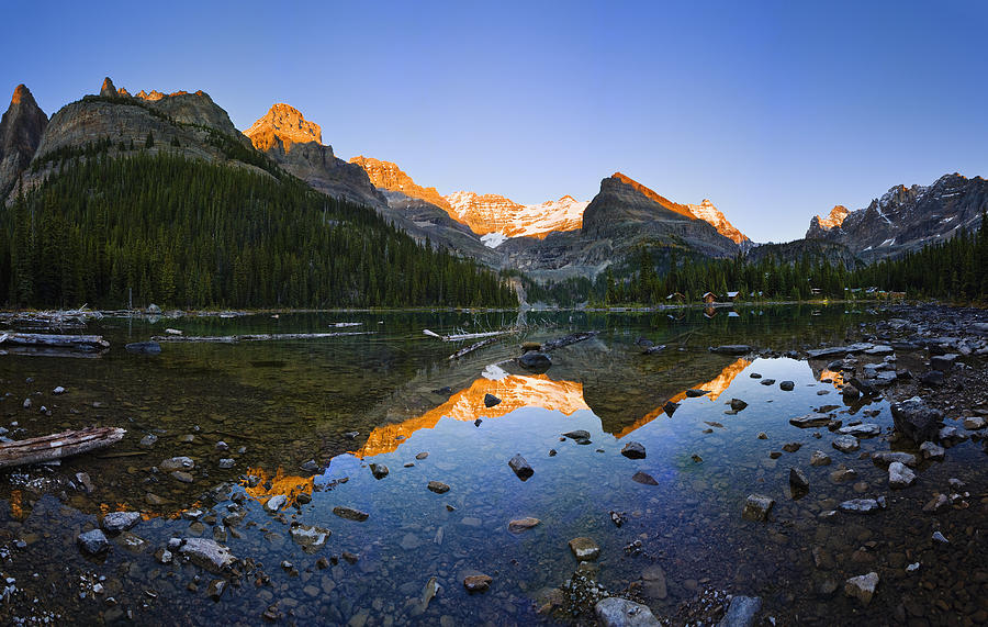 Lake Ohara And Mountains At Sunset Photograph by Yves Marcoux