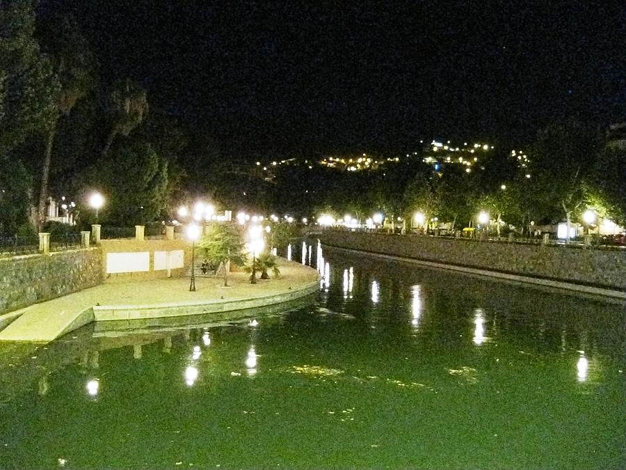 Lamp Post Reflection By The River At Night Granada Spain Photograph by John Shiron