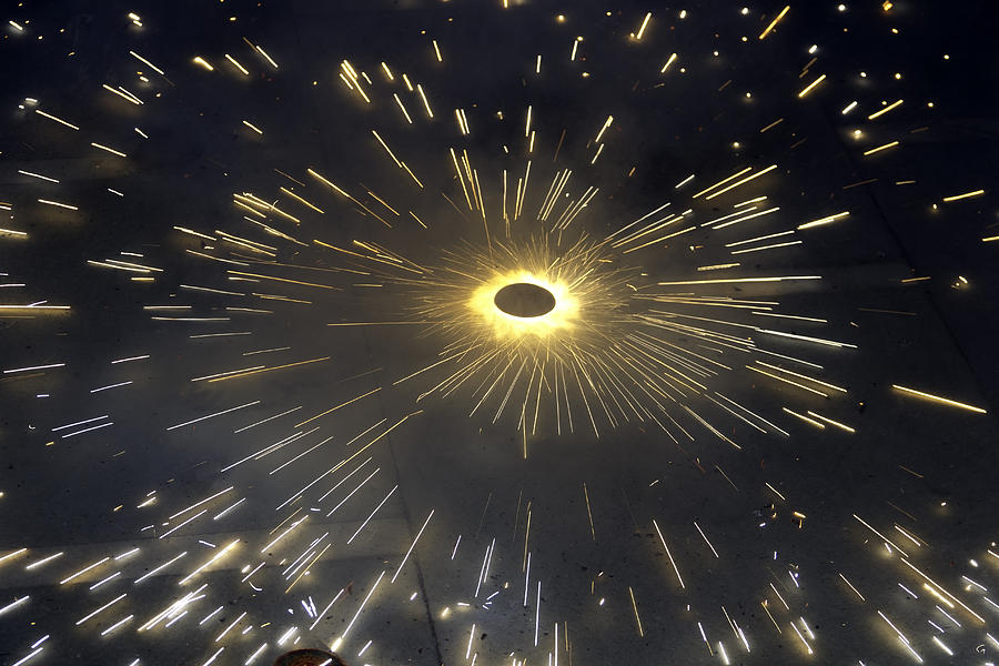 Large number of sparks from a spinning firecracker during Diwali Photograph by Ashish Agarwal