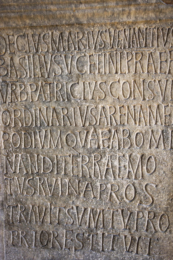 Latin Inscription On The Wall In The Colosseum Photograph by Gonzalo Azumendi