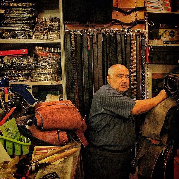 Summer Photograph - Leather Craftsman by Mehdi Shahmardi