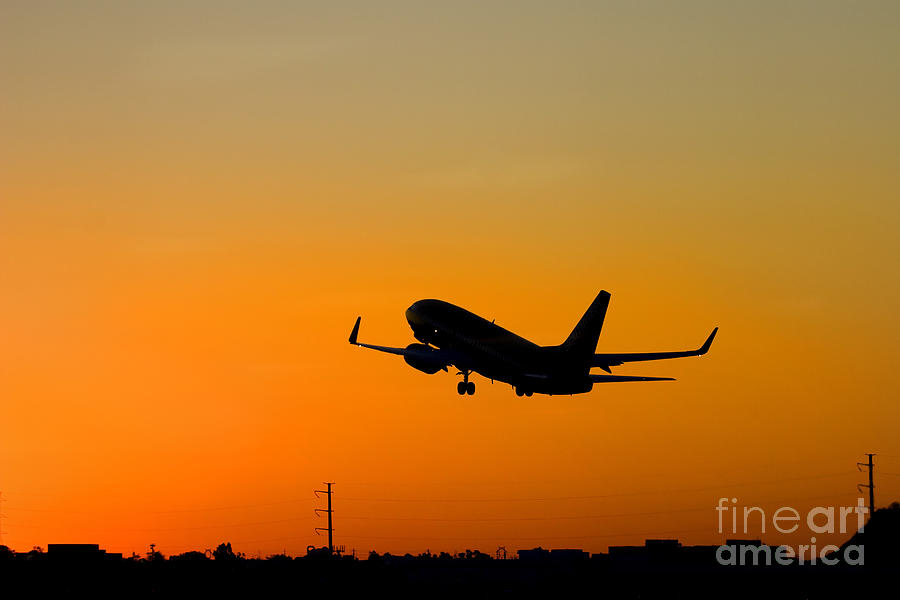 Jet Photograph - Leaving on a jet plane by Michael Dawson