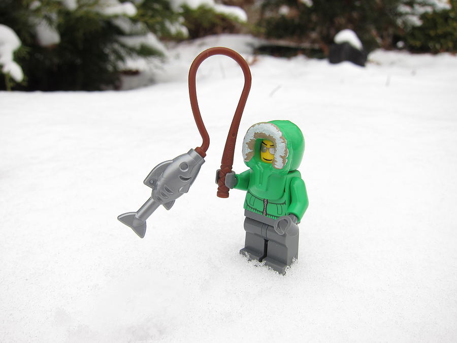 Winter Photograph - LEGO Mini Eskimo With Catch Of The Day by Sven Migot