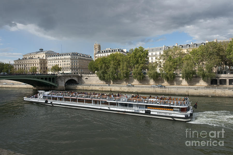 Leisure cruise boat in Paris Photograph by Fabrizio Ruggeri