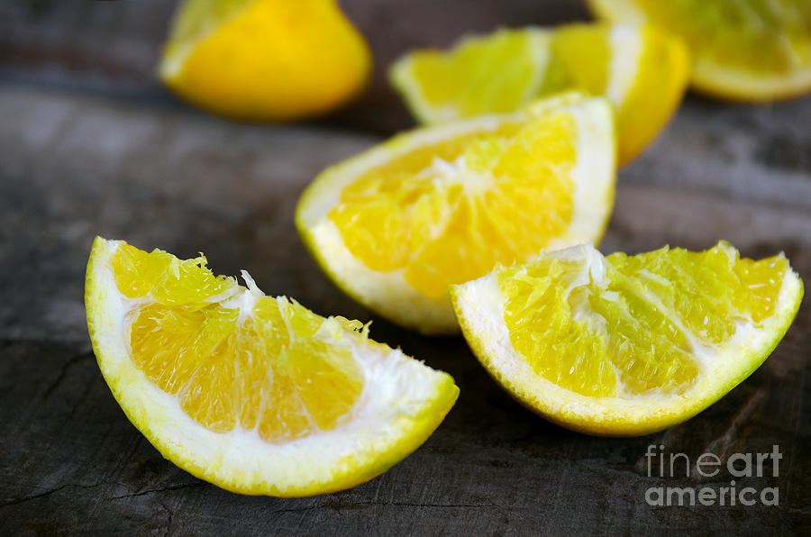 Juice Photograph - Lemon quarters by Carlos Caetano