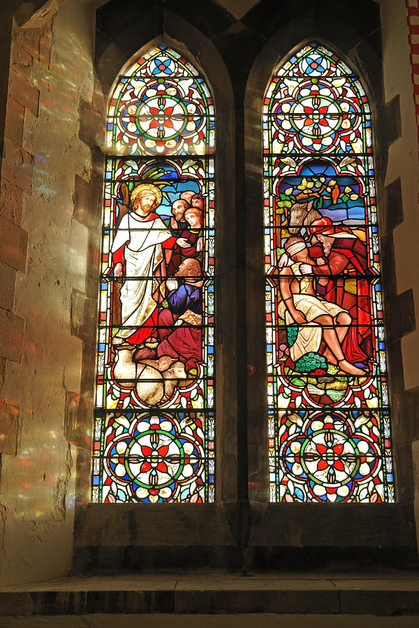 Light filtering through a set of stained glass windows at St Mary Church in Dover Castle Photograph by Ashish Agarwal