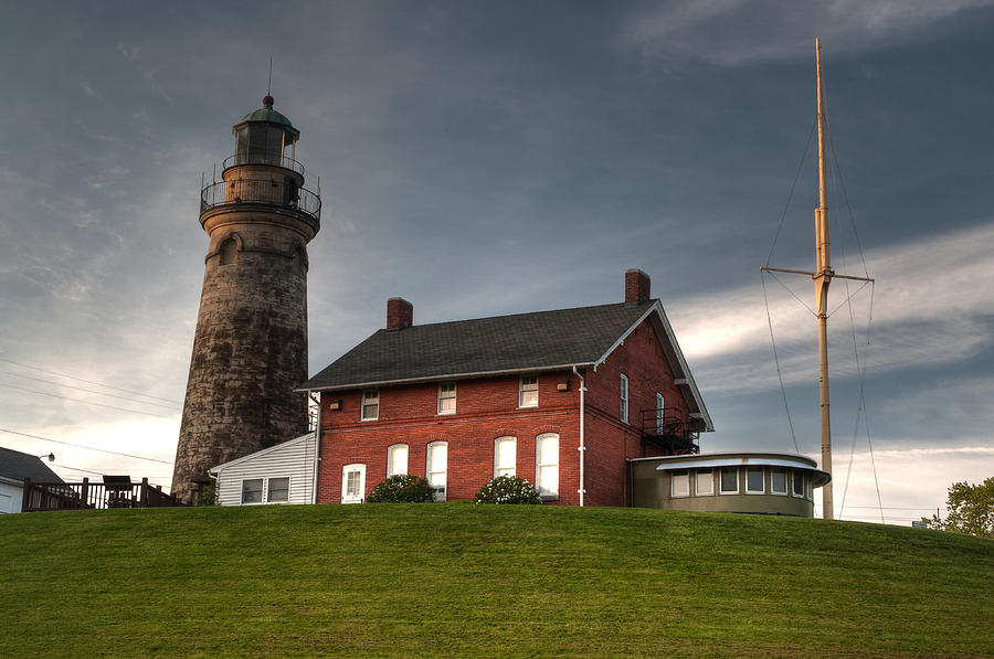Lighthouse at Fairport Harbor Photograph by At Lands End Photography