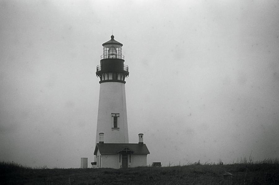 Lighthouse in fog Photograph by HW Kateley