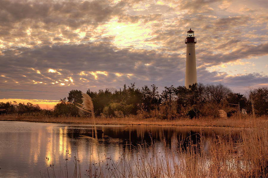 Lighthouse Winter Sunrise Photograph by Tom Singleton