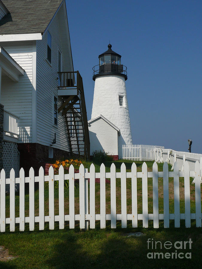 Lighthouse with Picket Fence Photograph by Jeanne  Woods