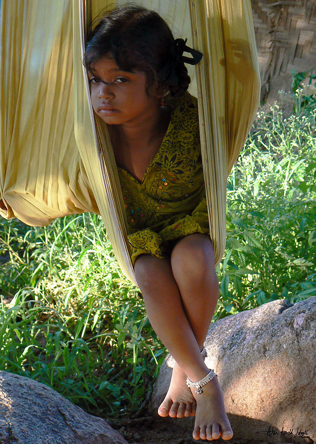 Little girl on a sling Photograph by John Arnold Lafuente - Fine Art ...