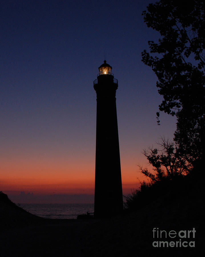 Little Sable Point Lighthouse after Sunset Photograph by Grace Grogan