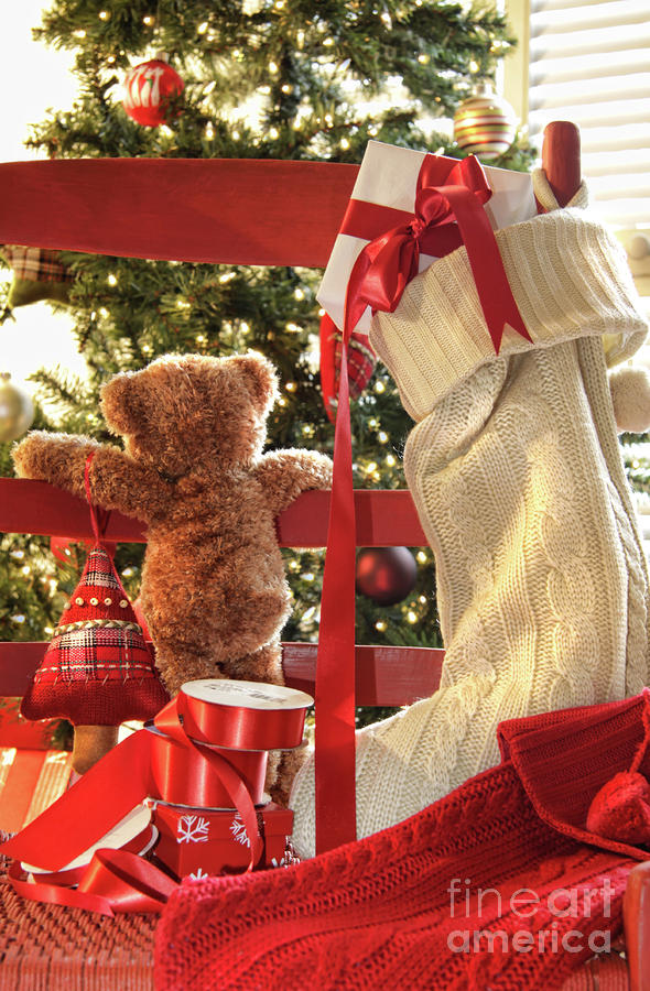 Christmas Photograph - Little teddy bear looking through chair by Sandra Cunningham