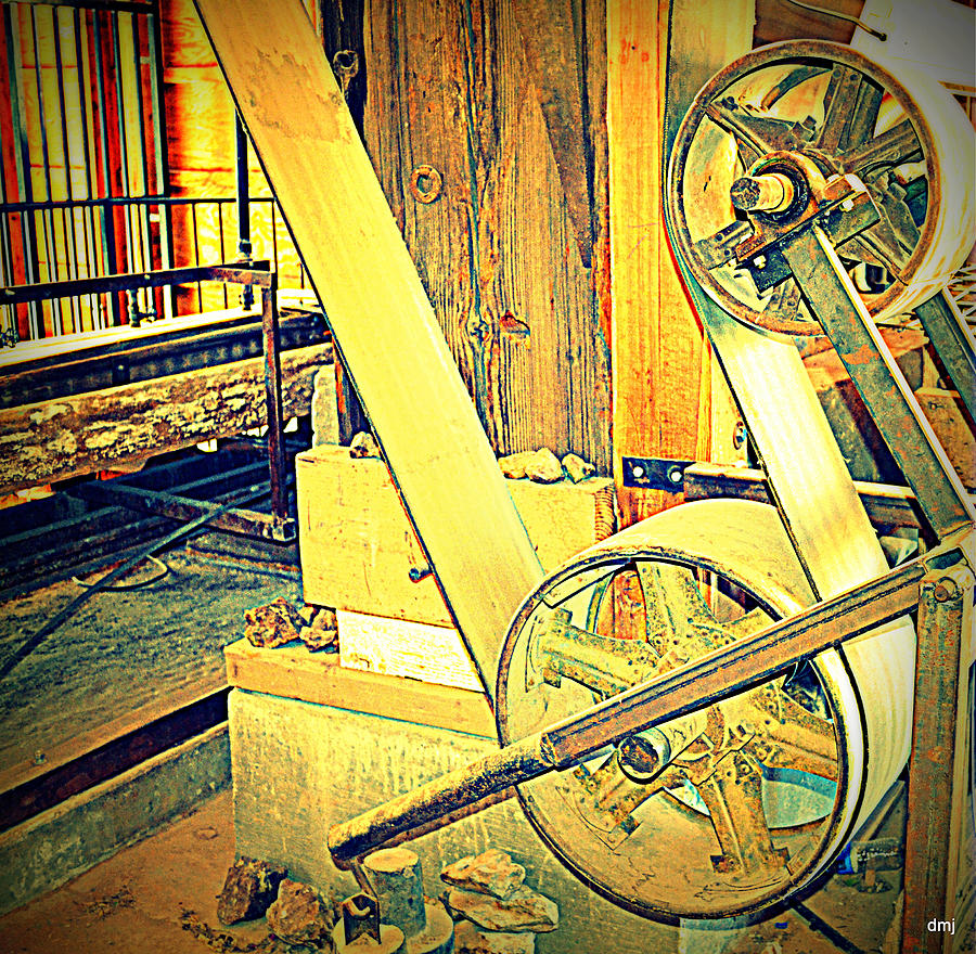 Little Wheel Spins Big Wheel Goes Round And Round Photograph by Diane montana Jansson