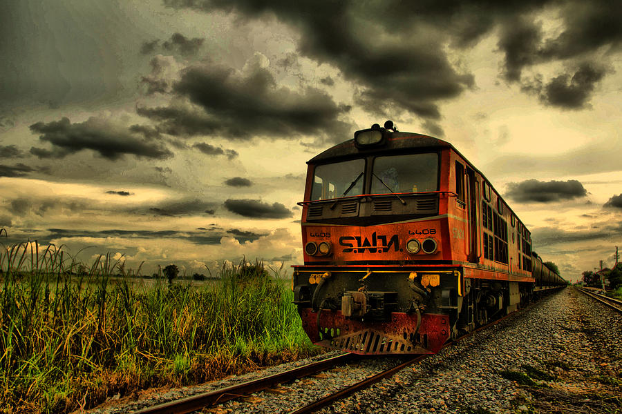 Sunset Photograph - Locomotive in Thailand. by Phaitoon Chooti