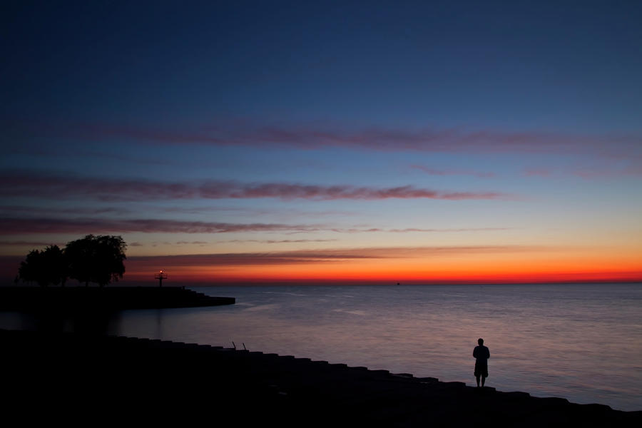 Lone Fisherman At Dawn Photograph by Sven Brogren