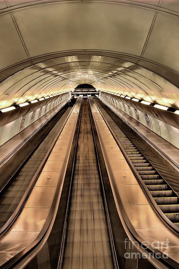long and fast escalator in Prague Photograph by Joerg Lingnau
