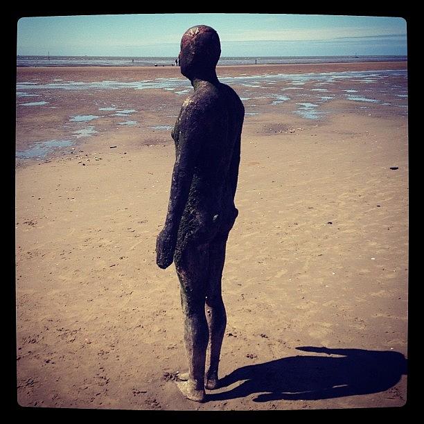 Iron Man Photograph - Looking Out To Sea, But What Can He by Conor Duffy