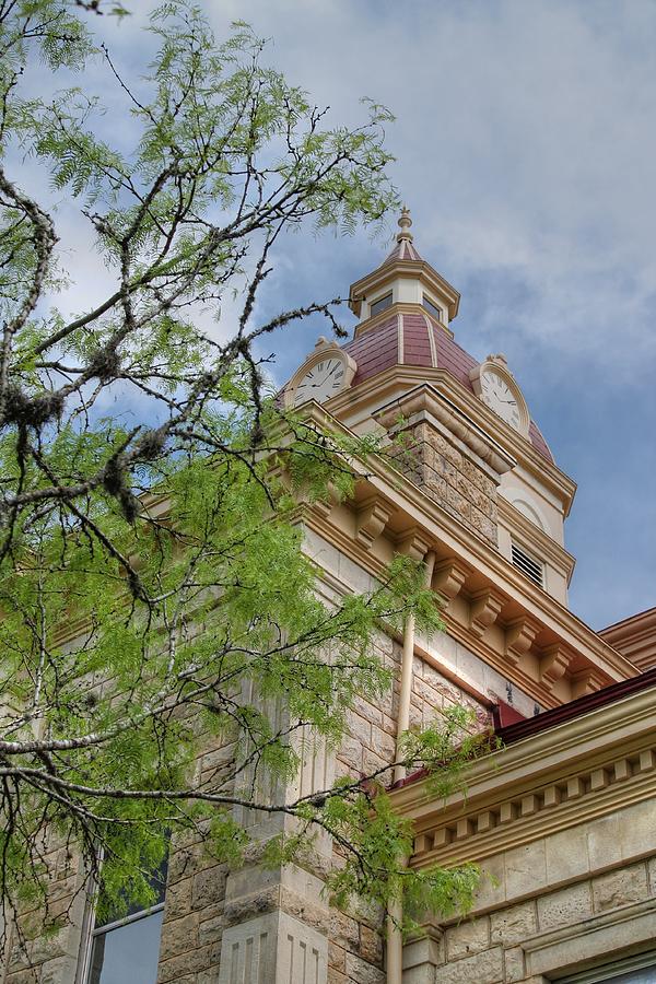 Clock Photograph - Looking Up at Bandera County Courthouse in Portrait by Sarah Broadmeadow-Thomas