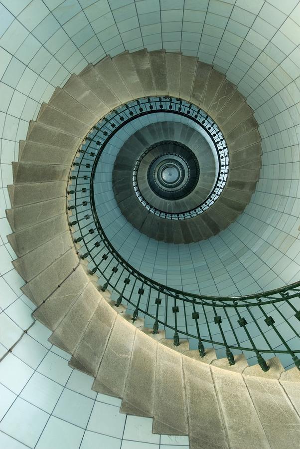 Looking Up The Spiral Staircase Of The Photograph by Axiom Photographic