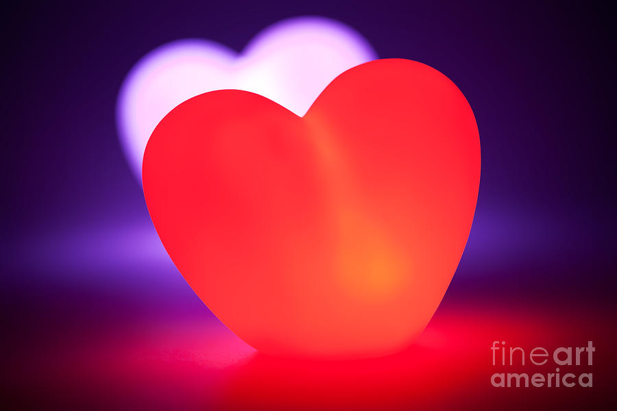 Love heart glowing red Photograph by Simon Bratt