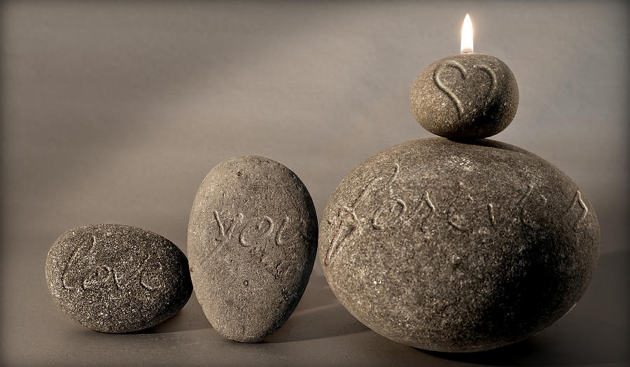 love you forever - An engraved message gives light to a stone heart Photograph by Pedro Cardona Llambias