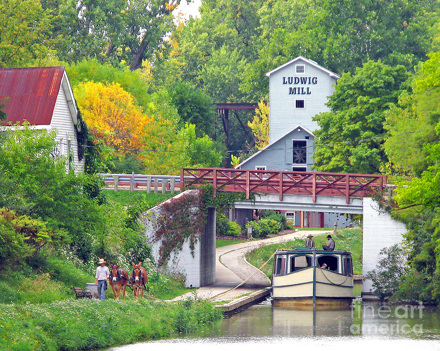 Ludwig Mill and Canal Boat Photograph by Jack Schultz