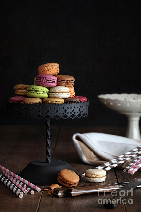 Cake Photograph - Macaroons on cake stand with dark background by Sandra Cunningham