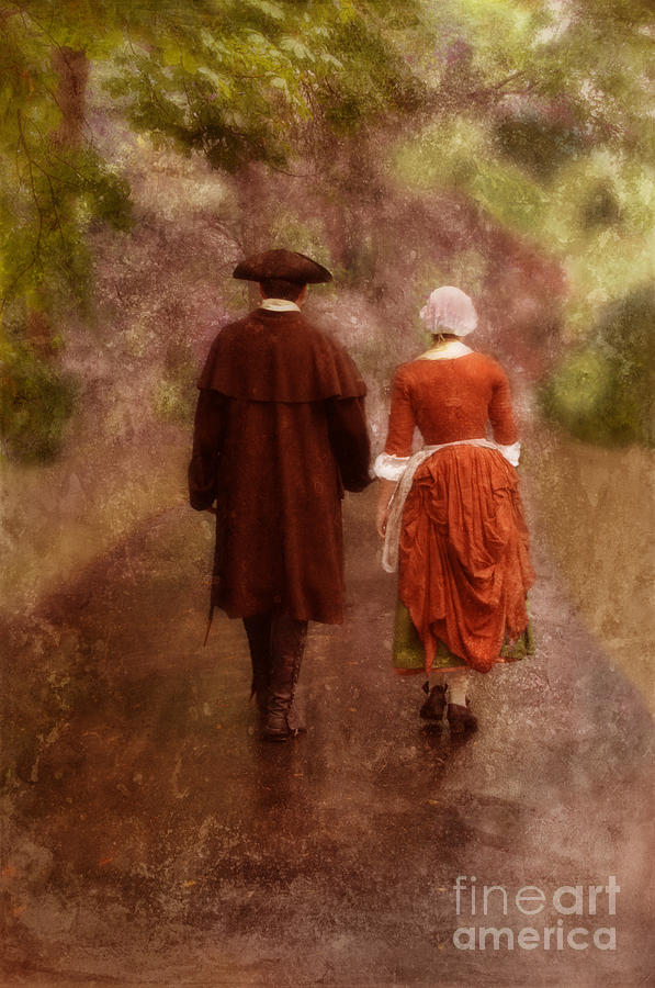 Man and Woman in 18th Century Clothing Walking Photograph by Jill Battaglia