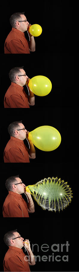 Man Bursting A Balloon Photograph by Ted Kinsman